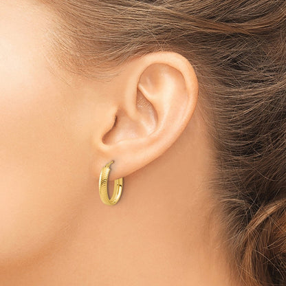 14K Yellow Gold Polished And Textured Oval Hoop Earrings