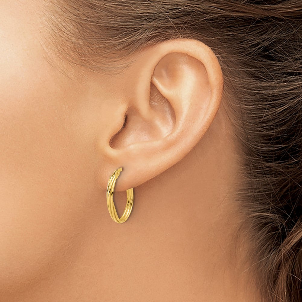 14K Yellow Gold Polished And Grooved Twist Oval Hoop Earrings