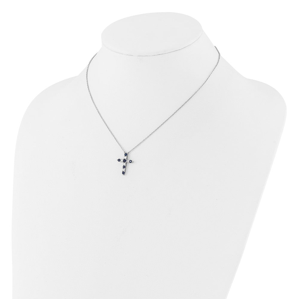 Sterling Silver Rhodium Plated Dark Blue CZ Sept Birthstone Cross w/2in Ext Necklace