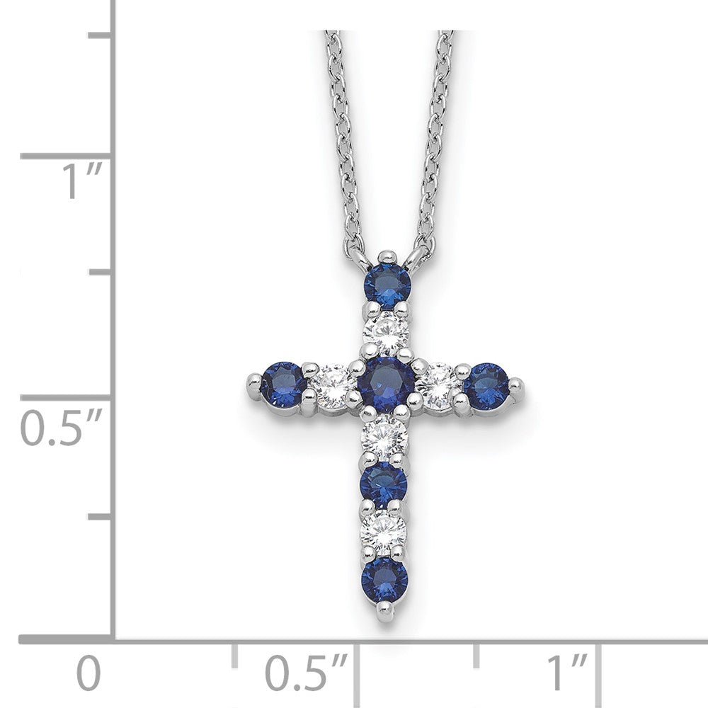 Sterling Silver Rhodium Plated Dark Blue CZ Sept Birthstone Cross w/2in Ext Necklace