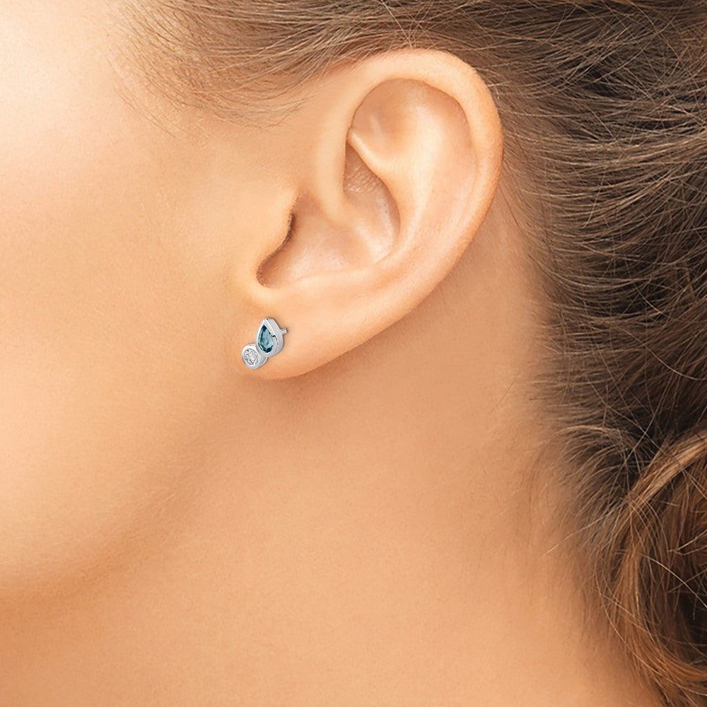 Ss/Rose Plated Sterling Silver Rhodium Sky Blue Topaz And Cz Post Earrings