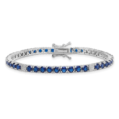 Sterling Silver Rhodium Plated Polished Blue and White CZ 7in Tennis Bracelet