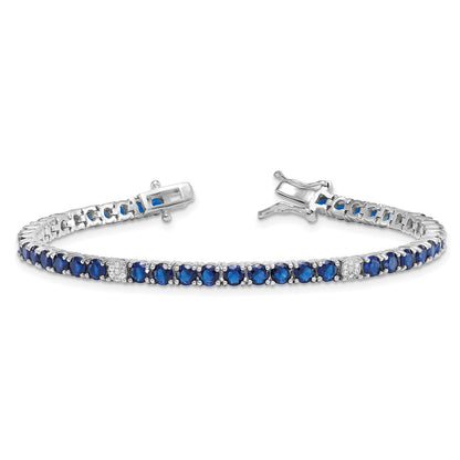 Sterling Silver Rhodium Plated Polished Blue and White CZ 7in Tennis Bracelet