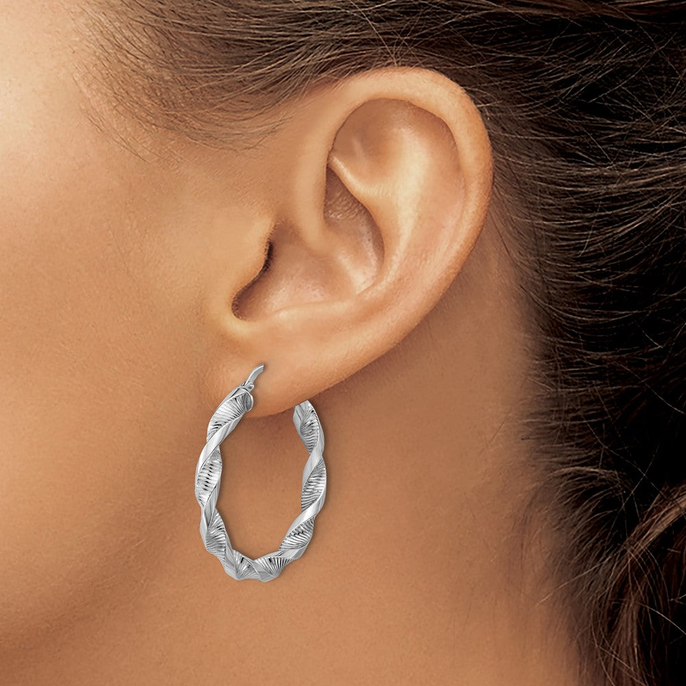 Sterling Silver Rh Plat Polish/Textured Twist Hoop Earrings