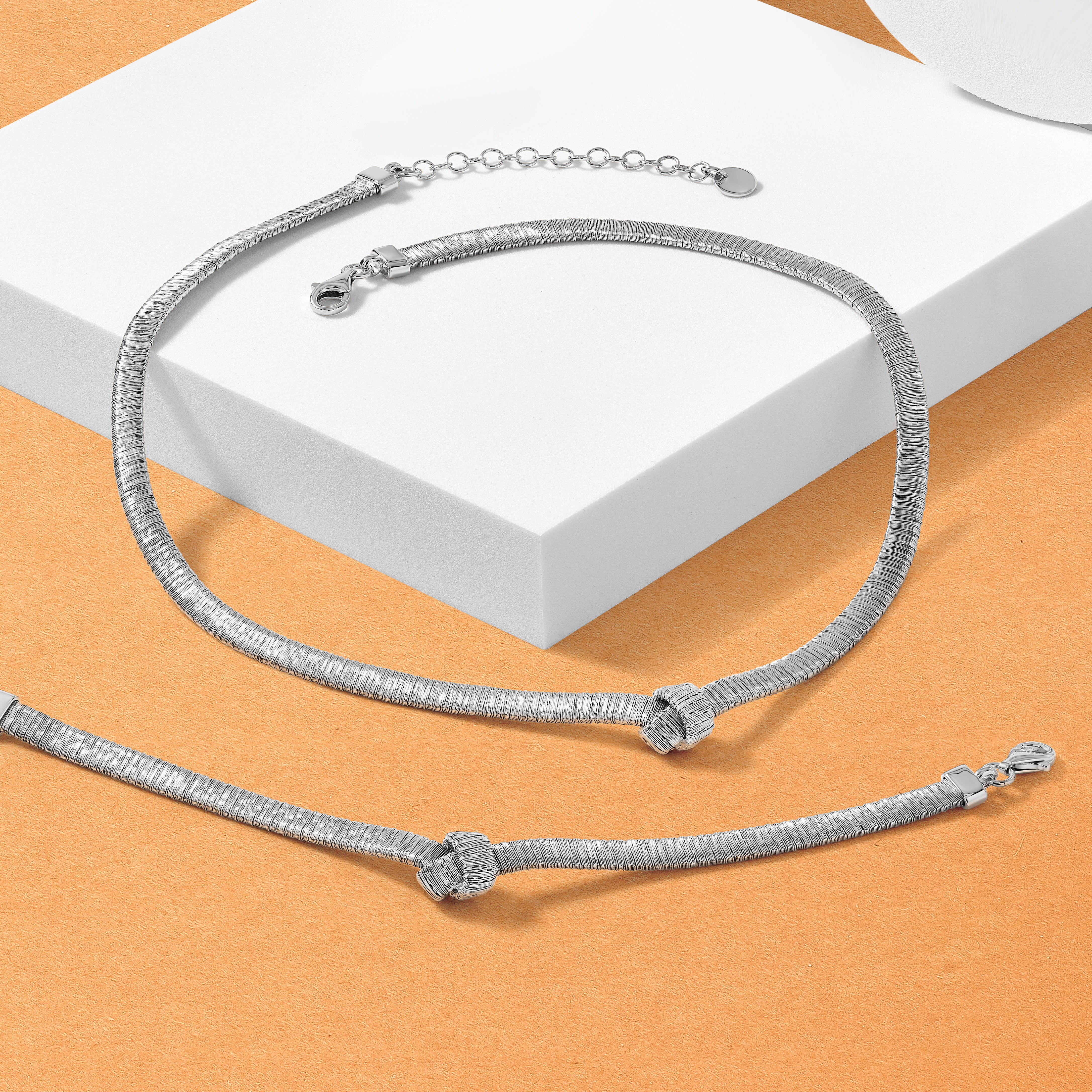 Sterling Silver Rhod Plat Texture Wrapped Knot 2In Ext. Necklace