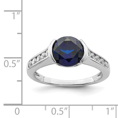 Sterling Silver Rhodium Plated Synthetic Blue Sapphire And Cz Bezel Ring