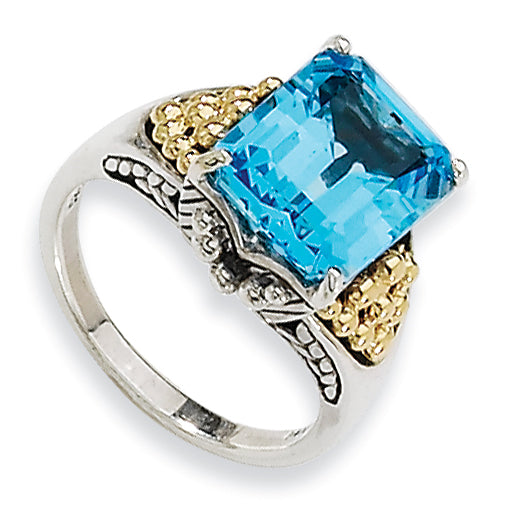 14K/Silver Two Tone Sterling Silver 14K Blue Topaz Ring (Size 6 Only)