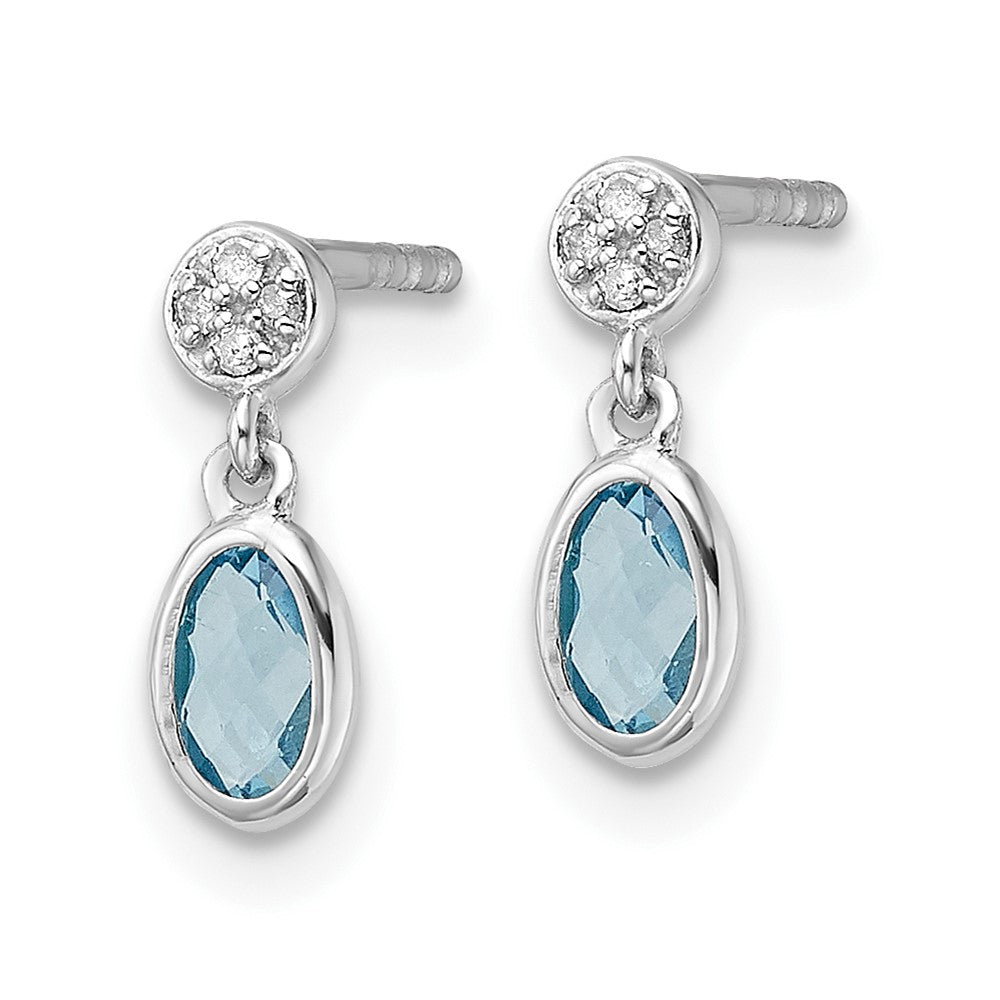 Sterling Silver Rhodium Plated White Ice .02ct. Dia. and Blue Topaz Post Earrings