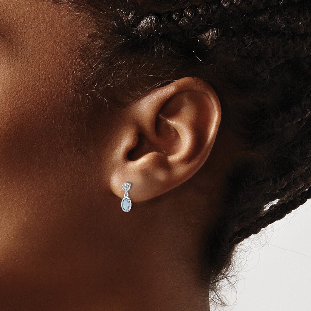 Sterling Silver Rhodium Plated White Ice .02ct. Dia. and Blue Topaz Post Earrings