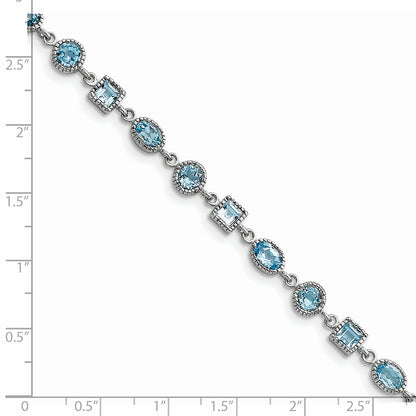 7 Inch Sterling Silver Rhodium-Plated Blue Topaz Bracelet