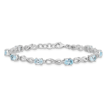 7 Inch Sterling Silver Rhodium-Plated Blue Topaz Figure 8 Bracelet
