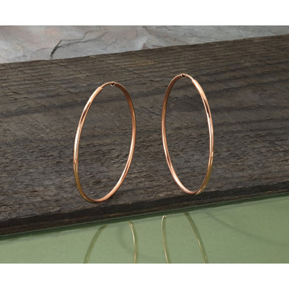 14k-rose-gold-1-5mm-polished-endless-hoop-earrings
