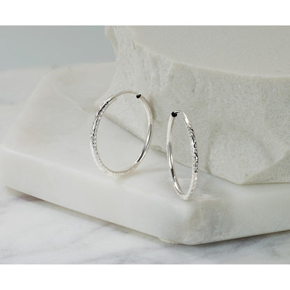 14K White Gold D/c 1.50mm Endless Hoop Earrings