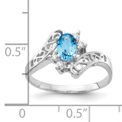 14k White Gold 6x4mm Oval Blue Topaz A Real Diamond ring