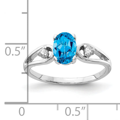 14k White Gold 7x5mm Oval Blue Topaz A Real Diamond ring