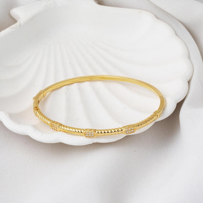 14K Yellow Gold Trendy Twisted Hinged Cuff Cubic Zirconia Bangle