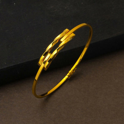 14K Yellow Gold Twisted Minimalist Ribbed Bangle