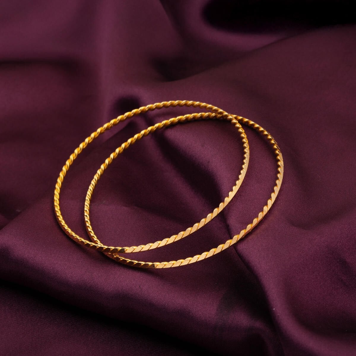 22K Yellow Gold Twisted Ajda Bangle (26 g)