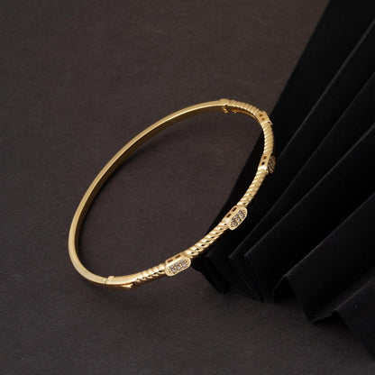 14K Yellow Gold Trendy Twisted Hinged Cuff Cubic Zirconia Bangle