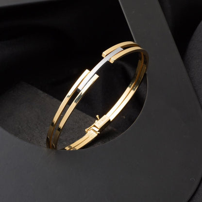 14K Gold Ribbed Lock Bangle