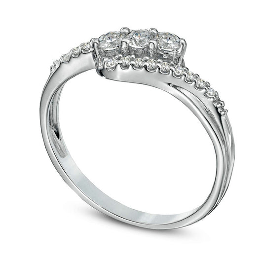0.25 CT. T.W. Natural Diamond Three Stone Swirl Ring in Solid 10K White Gold