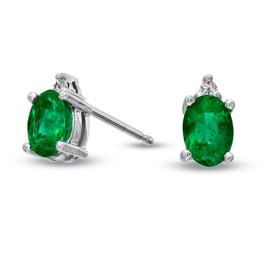 Oval Emerald and Diamond Accent Stud Earrings in 14K White Gold