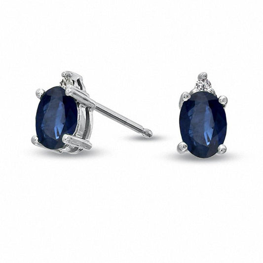 Oval Blue Sapphire and Diamond Accent Stud Earrings in 14K White Gold