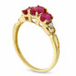 Oval Lab-Created Ruby and Diamond Accent Three Stone Ring in Solid 10K Yellow Gold
