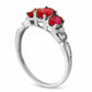 Oval Lab-Created Ruby and Diamond Accent Three Stone Ring in Solid 10K White Gold