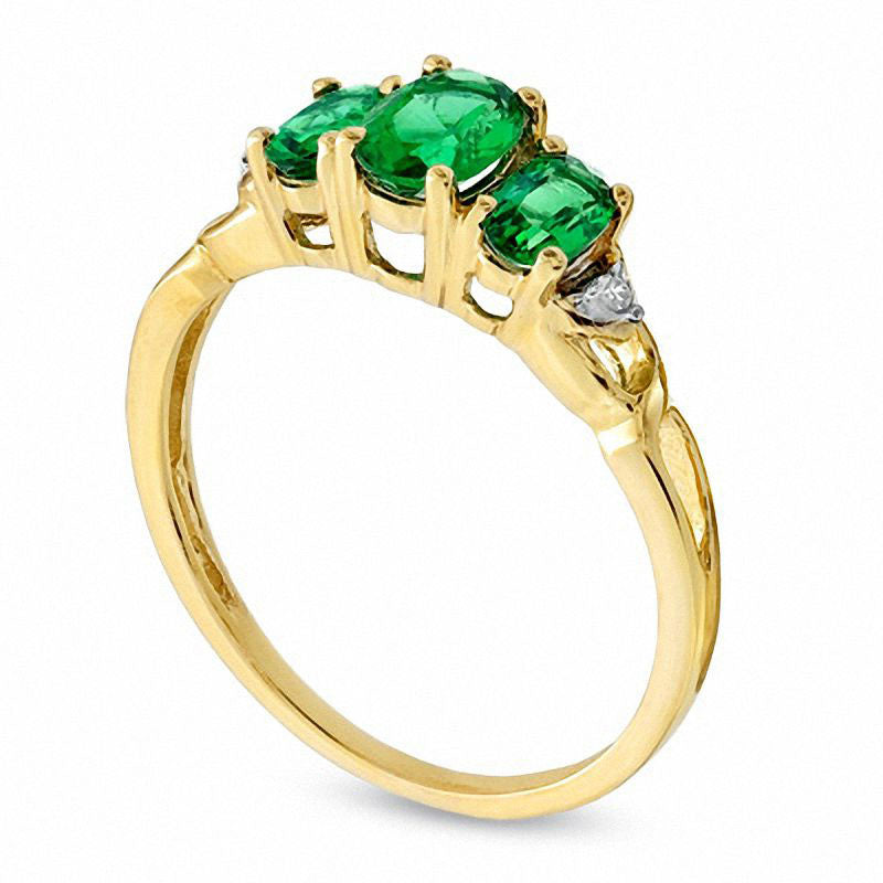 Oval Lab-Created Emerald and Diamond Accent Three Stone Ring in Solid 10K Yellow Gold