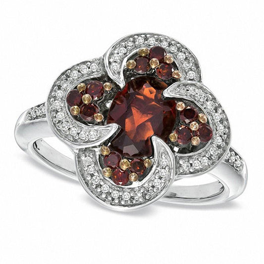 Oval Garnet and 0.33 CT. T.W. Enhanced Red and White Natural Diamond Ring in Sterling Silver