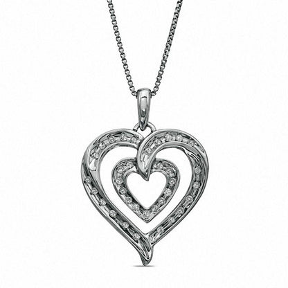 0.13 CT. T.W. Natural Diamond Double Row Heart Pendant in Sterling Silver