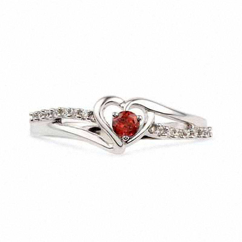 3.0mm Garnet and 0.05 CT. T.W. Natural Diamond Heart Ring in Sterling Silver