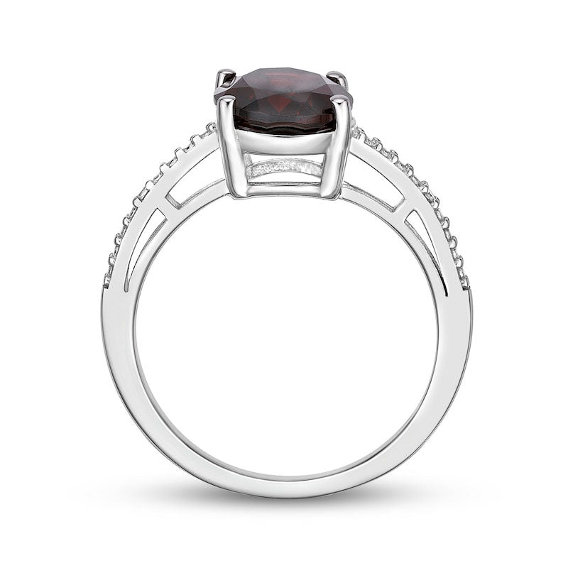 Oval Garnet and Natural Diamond Accent Ring in Sterling Silver