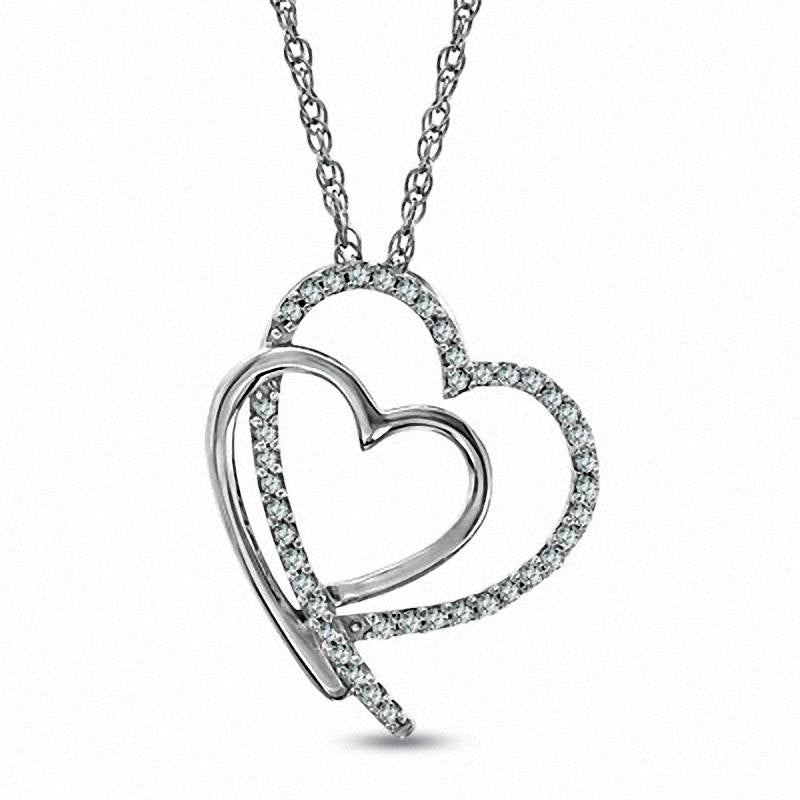 0.13 CT. T.W. Natural Diamond Shadowed Tilted Heart Pendant in Sterling Silver