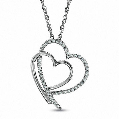 0.13 CT. T.W. Natural Diamond Shadowed Tilted Heart Pendant in Sterling Silver