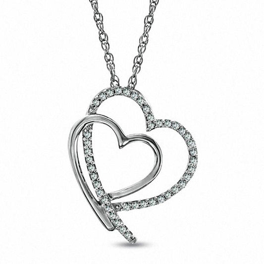0.13 CT. T.W. Natural Diamond Shadowed Tilted Heart Pendant in Sterling Silver