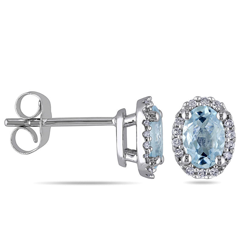 Oval Aquamarine and Diamond Accent Frame Stud Earrings in 10K White Gold