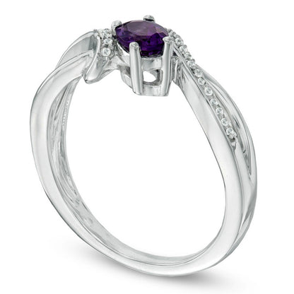 Oval Amethyst and 0.10 CT. T.W. Natural Diamond Split Shank Ring in Sterling Silver