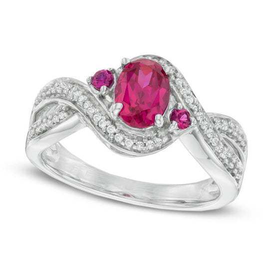 Oval Lab-Created Ruby and 0.17 CT. T.W. Diamond Swirl Ring in Sterling Silver