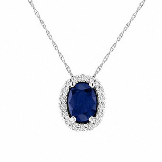 Oval Blue Sapphire and 0.17 CT. T.W. Natural Diamond Pendant in 14K White Gold