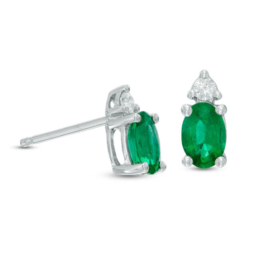 Oval Emerald and Diamond Accent Stud Earrings in 10K White Gold