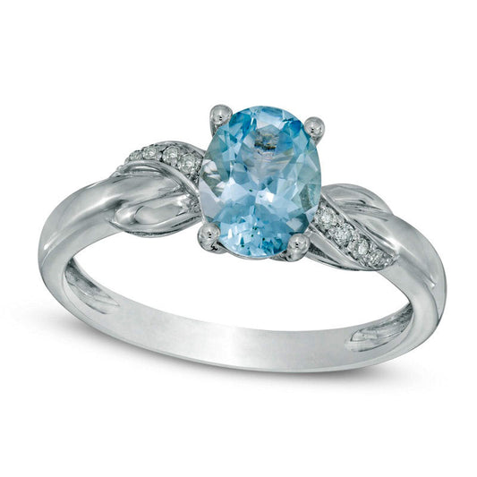 Oval Aquamarine and Natural Diamond Accent Twist Ring in Solid 10K White Gold
