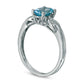 Oval Aquamarine and Natural Diamond Accent Twist Ring in Solid 10K White Gold