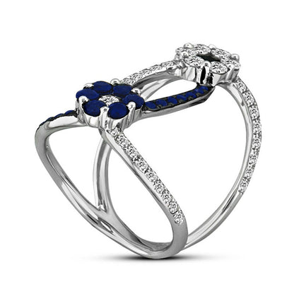 Blue Sapphire and 0.88 CT. T.W. Natural Diamond Flower Orbit Ring in Solid 14K White Gold