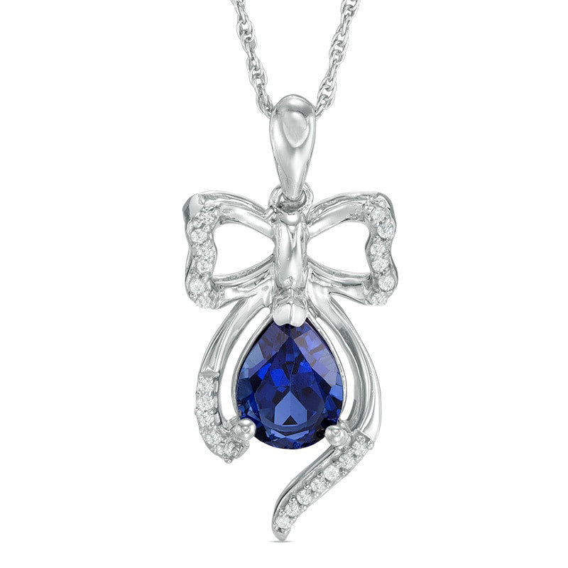 Pear-Shaped Lab-Created Blue Sapphire and 0.1 CT. T.W. Diamond Bow Pendant in Sterling Silver