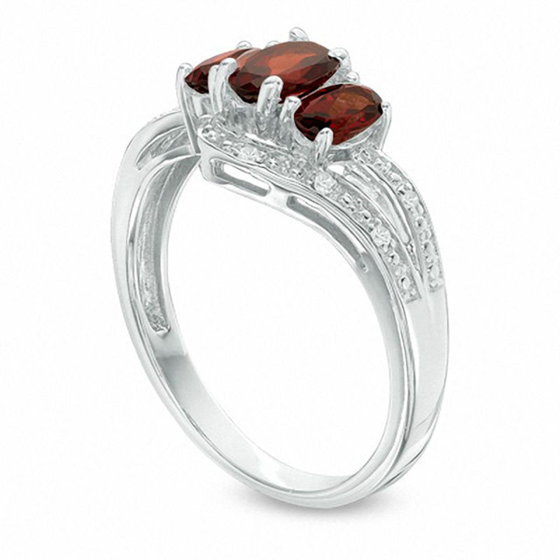 Oval Garnet and White Topaz Three Stone Bypass Ring in Sterling Silver