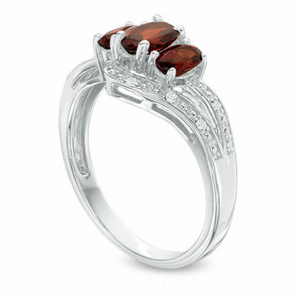 Oval Garnet and White Topaz Three Stone Bypass Ring in Sterling Silver