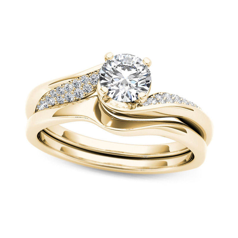0.63 CT. T.W. Natural Diamond Twist Bypass Bridal Engagement Ring Set in Solid 14K Gold