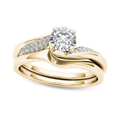 0.63 CT. T.W. Natural Diamond Twist Bypass Bridal Engagement Ring Set in Solid 14K Gold